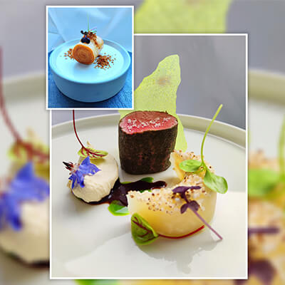 Ein Gourmetgericht mit einer Kombination aus Fleisch, Saucen und Kräutern.