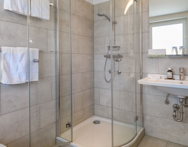 Das Badezimmer mit Dusche.