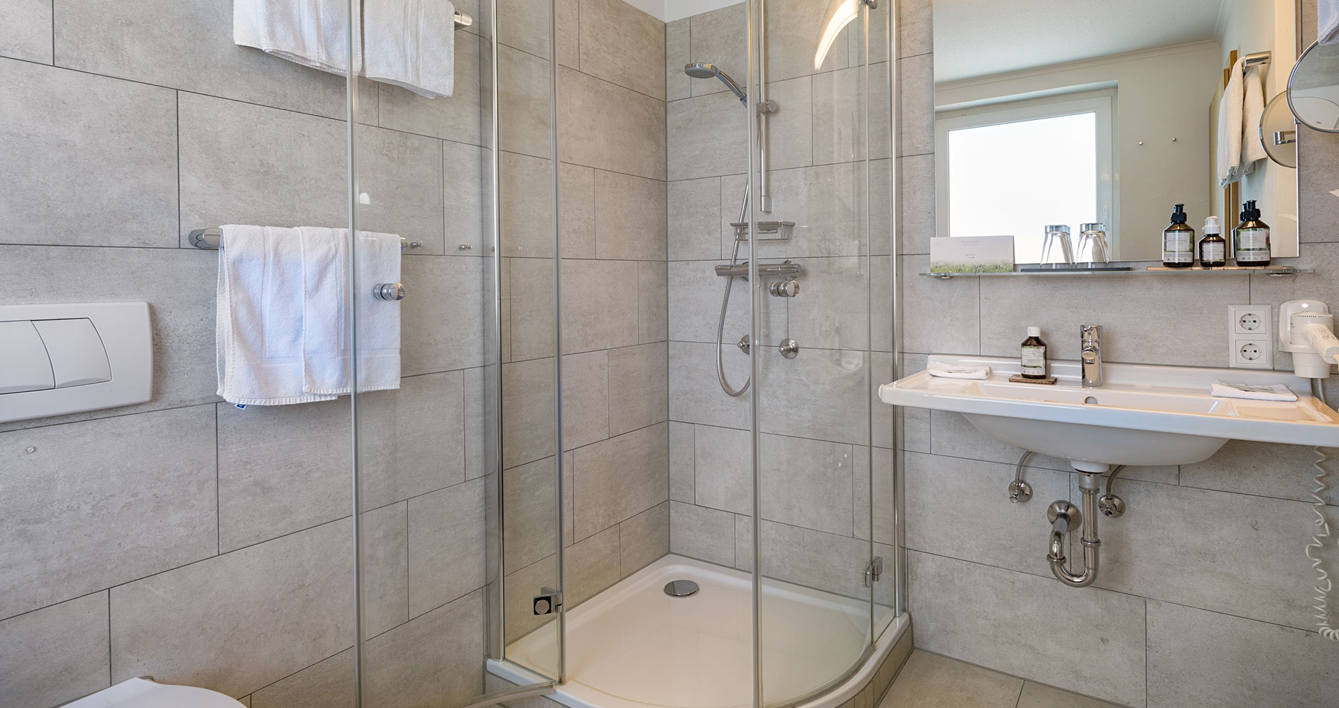 Das Badezimmer mit Dusche.